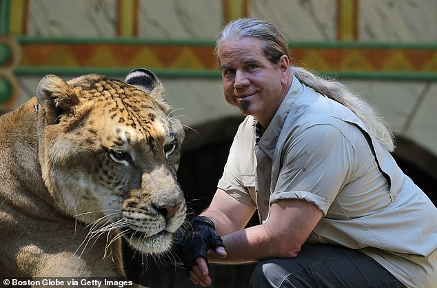 Dr. Bhagavan Antle is pictured with Hercules the liger at the wildlife reserve in Myrtle Beach, South Carolina