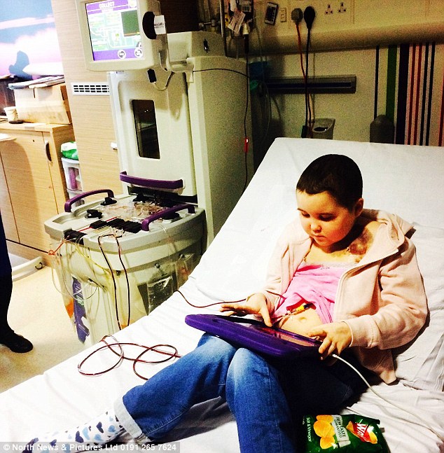 Amelia (pictured while receiving treatment) suffered from acute myeloid leukaemia