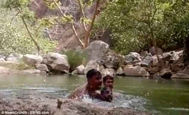 Bad move: Despite being poor swimmers, Chetan Khatik, 28, Sudarshan Chandel, 22, and Radheyshyam Khatik, 27, went for a dip in a deep pond in Rajasthan, western India