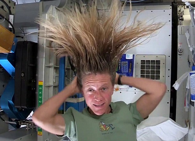 Last year, Nasa astronaut Karen Nyberg revealed how tricky it can be to wash long hair in space. She can be seen (pictured) putting water on to her scalp, battling with a few escaping bubbles. Then she adds leave-in shampoo, which she works into her hair. Her tools are stuck to the wall to prevent them from escaping