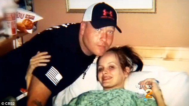 Mom and dad: James and Carrie Maize on Tuesday after she had given birth to Decklen via emergency C-section