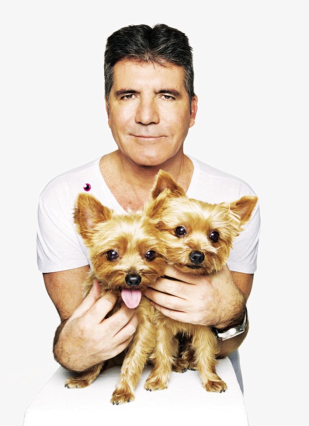 TV guru Simon Cowell puts himself in the doghouse after swiping partner... on her husband