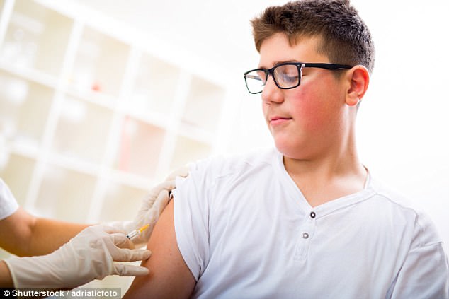 Schools should urge boys – and not just girls – to have a controversial vaccine to protect them from cancer, teachers said yesterday (Stock image)