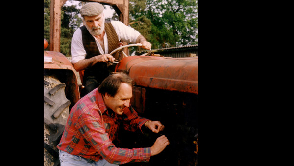 joe and eddie grundy try to get their ancient tractor started